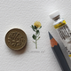 Illustration for article titled Artists makes 365 beautiful tiny paintings for ants